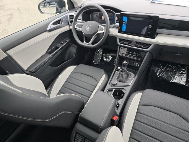 Photo of 2025 Deep Black Pearl Effect Volkswagen Taos