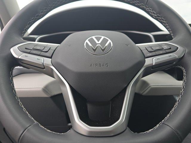 Photo of 2025 Deep Black Pearl Effect Volkswagen Taos