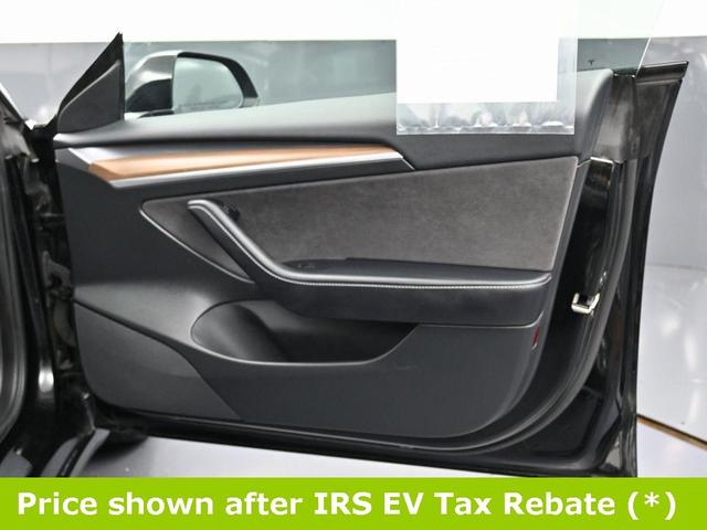 Photo of 2023 Black Tesla Model 3