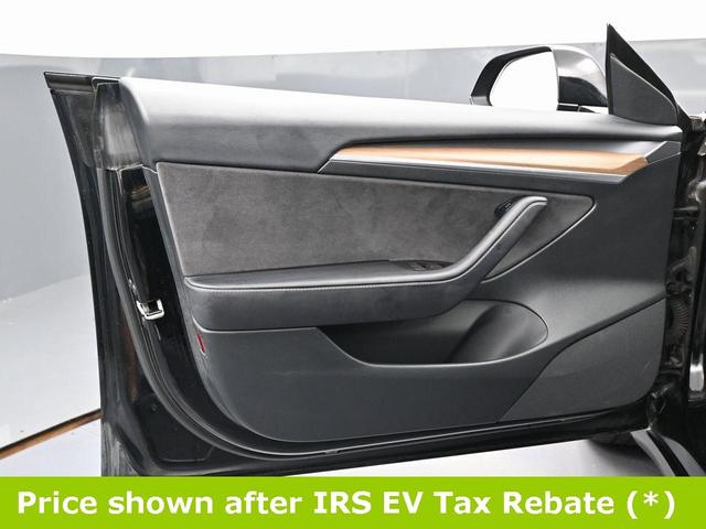 Photo of 2023 Black Tesla Model 3