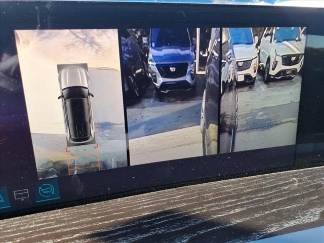 Photo of 2025 Black Raven Cadillac Escalade IQ
