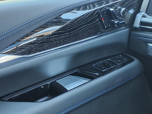 Photo of 2025 Black Raven Cadillac Escalade IQ