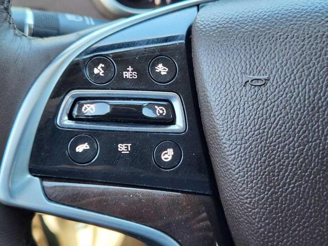 Photo of 2016 Silver Coast Metallic Cadillac SRX
