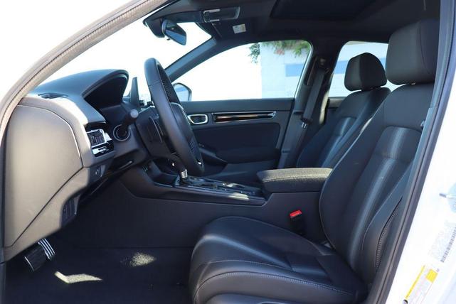 Photo of 2025 Platinum White Pearl Honda Civic Hybrid