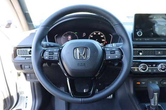 Photo of 2025 Platinum White Pearl Honda Civic Hybrid
