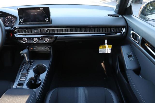 Photo of 2025 Platinum White Pearl Honda Civic Hybrid