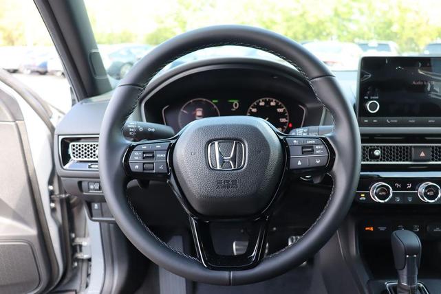 Photo of 2025 Urban Gray Pearl Honda Civic Hybrid