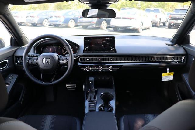 Photo of 2025 Urban Gray Pearl Honda Civic Hybrid