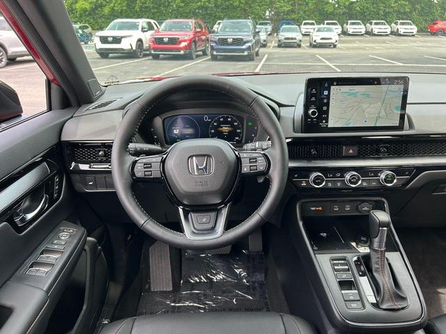 Photo of 2026 Radiant Red Metallic Honda CR-V Hybrid