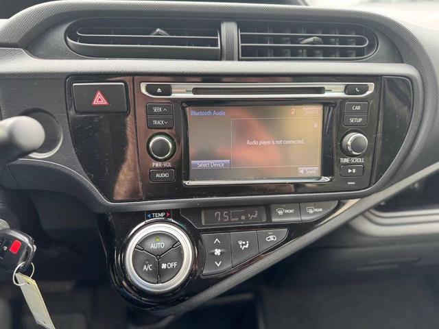 Photo of 2015 Super White Toyota Prius c