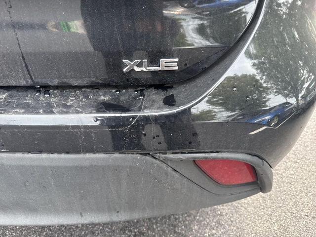 Photo of 2023 Midnight Black Metallic Toyota Highlander Hybrid
