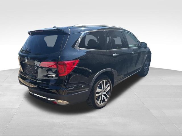 Photo of 2017 Crystal Black Pearl Honda Pilot