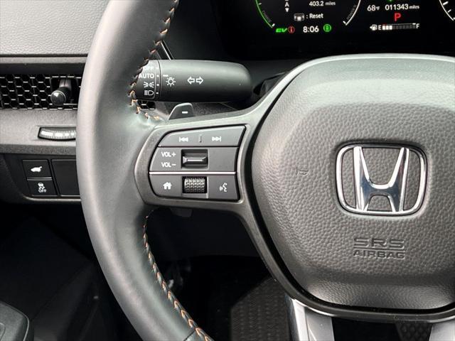 Photo of 2025 Radiant Red Metallic Honda CR-V Hybrid