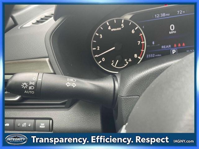 Photo of 2024 Pearl White Tricoat Nissan Altima