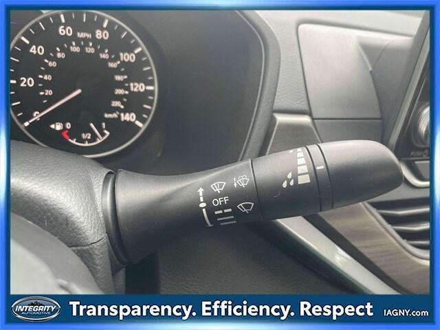 Photo of 2024 Pearl White Tricoat Nissan Altima