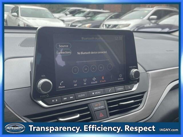 Photo of 2024 Pearl White Tricoat Nissan Altima