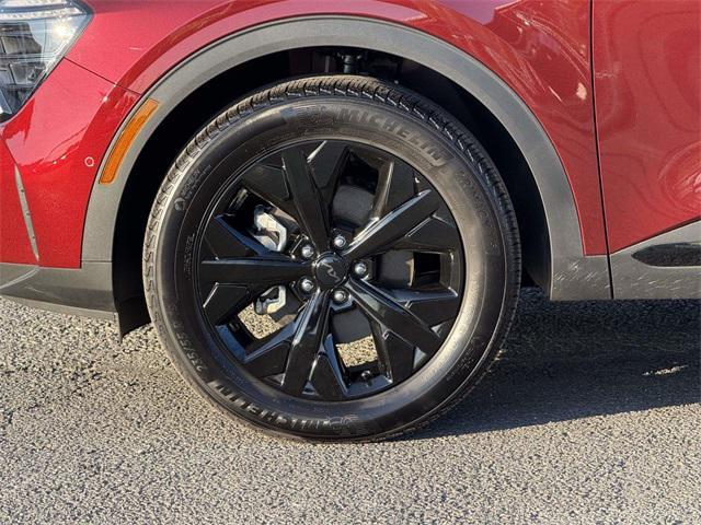 Photo of 2025 Dawning Red Kia Sportage
