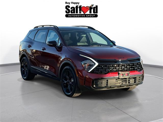 Photo of 2025 Dawning Red Kia Sportage