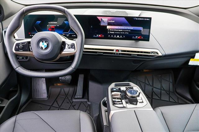 Photo of 2026 Aventurin Red Metallic BMW iX