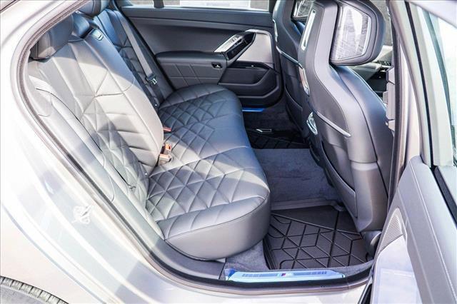 Photo of 2025 Oxide Grey Metallic BMW 740