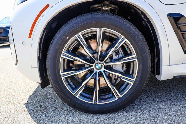 Photo of 2026 Mineral White Metallic BMW X5 PHEV