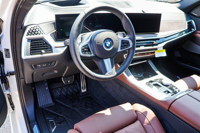 Photo of 2026 Mineral White Metallic BMW X5 PHEV