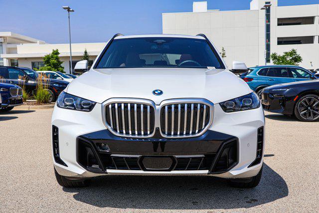 Photo of 2026 Mineral White Metallic BMW X5 PHEV