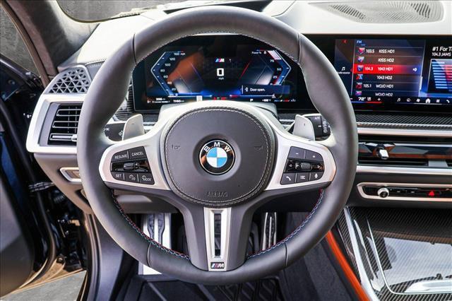 Photo of 2025 Black Sapphire Metallic BMW X7