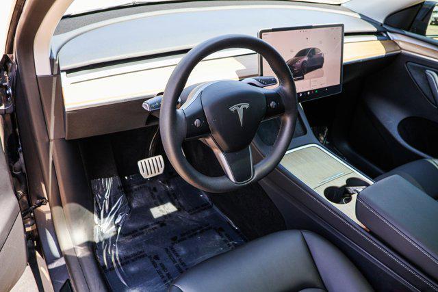Photo of 2023 Midnight Silver Metallic Tesla Model Y