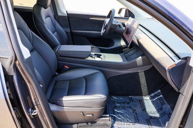 Photo of 2023 Midnight Silver Metallic Tesla Model Y