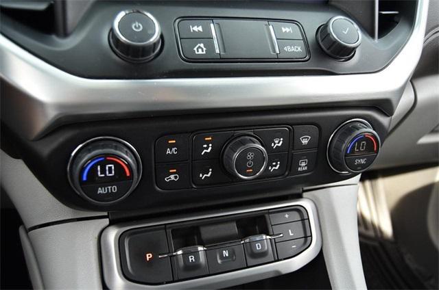 Photo of 2023 Volcanic Red GMC Acadia