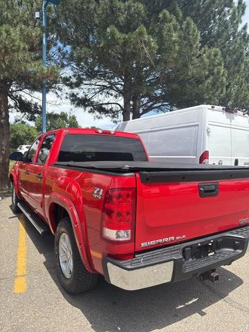 Photo of 2012 Fire Red GMC Sierra 1500
