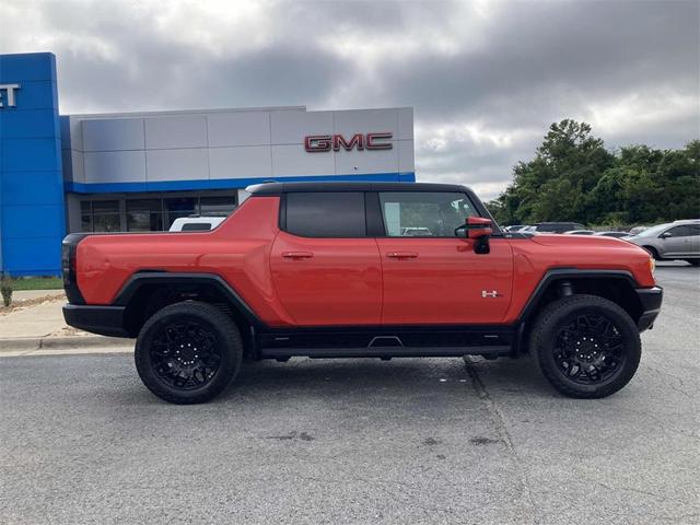 Photo of 2025 Solar Orange GMC HUMMER EV Pickup