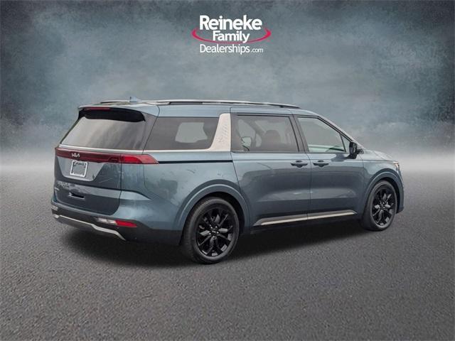 Photo of 2023 Astra Blue Kia Carnival
