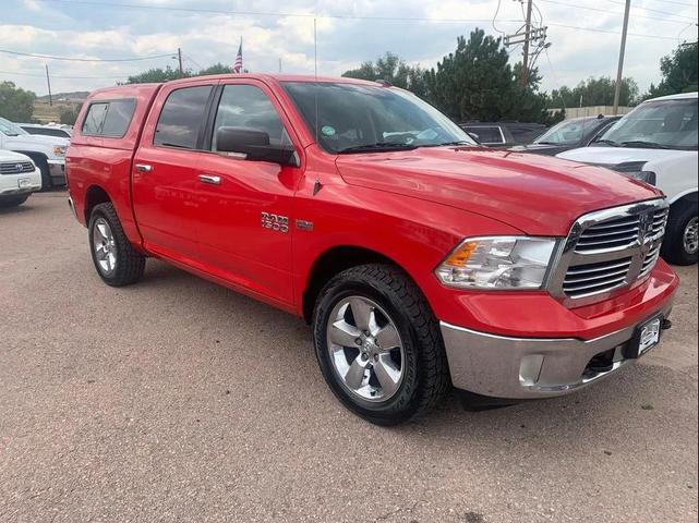 Photo of 2015 Flame Red Clearcoat RAM 1500