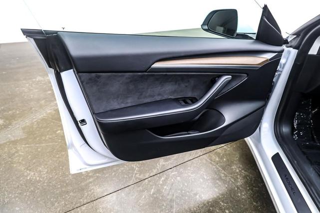 Photo of 2022 Pearl White Multi-Coat Tesla Model 3