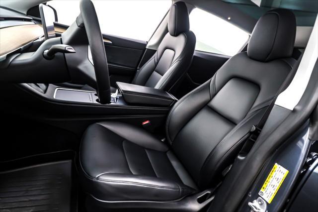 Photo of 2023 Midnight Silver Metallic Tesla Model Y