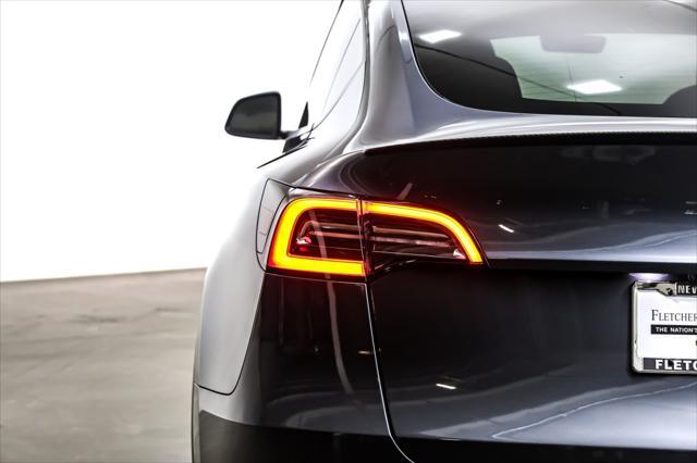 Photo of 2023 Midnight Silver Metallic Tesla Model Y