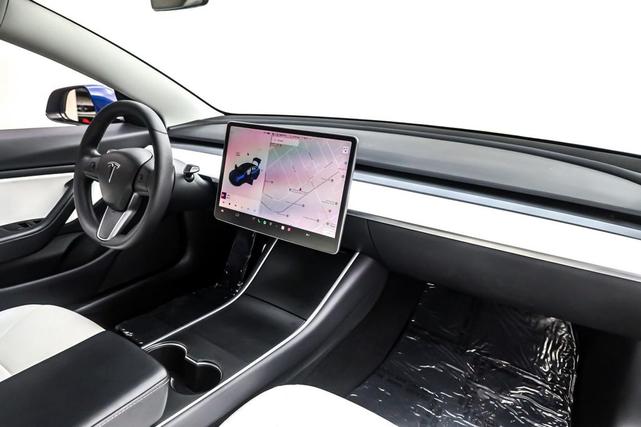 Photo of 2020 Deep Blue Metallic Tesla Model 3