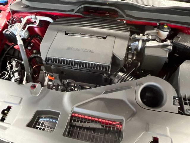 Photo of 2025 Radiant Red Metallic II Honda Pilot