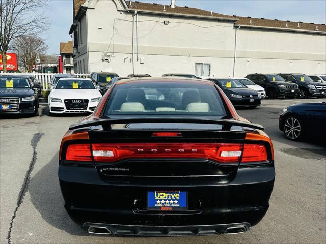 Photo of 2011 Toxic Orange Pearlcoat Dodge Charger