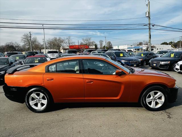 Photo of 2011 Toxic Orange Pearlcoat Dodge Charger