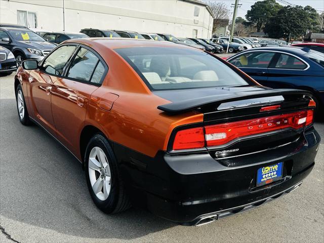 Photo of 2011 Toxic Orange Pearlcoat Dodge Charger