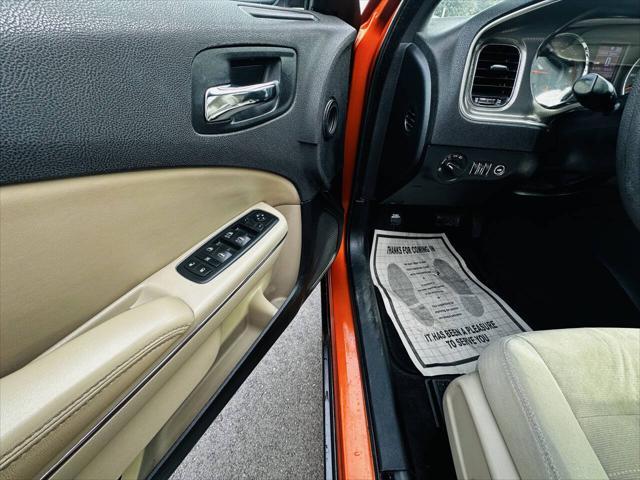 Photo of 2011 Toxic Orange Pearlcoat Dodge Charger