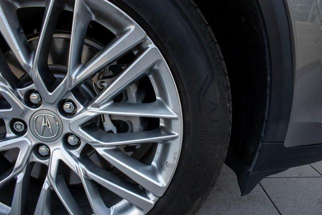 Photo of 2024 Liquid Carbon Metallic Acura MDX