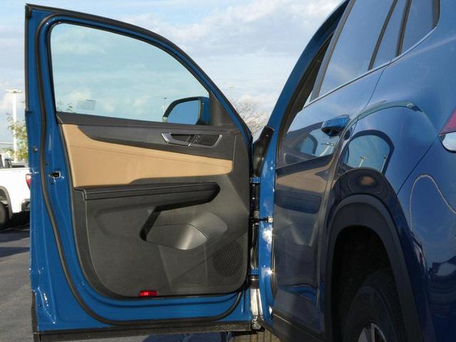 Photo of 2026 mountain lake blue metallic Volkswagen Atlas Cross Sport