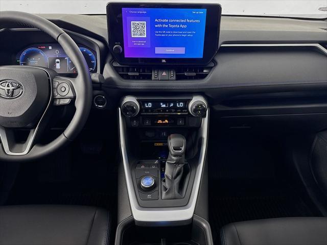 Photo of 2025 Cavalry Blue/Midnight Black Metallic Toyota RAV4 Hybrid
