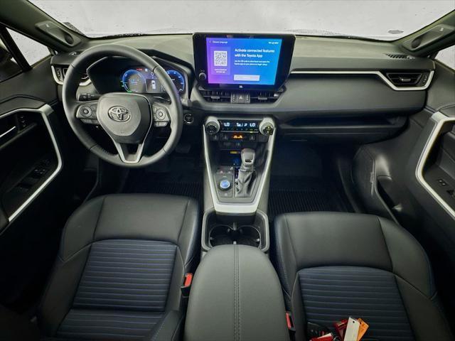 Photo of 2025 Cavalry Blue/Midnight Black Metallic Toyota RAV4 Hybrid