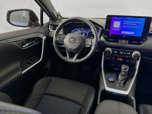 Photo of 2025 Cavalry Blue/Midnight Black Metallic Toyota RAV4 Hybrid