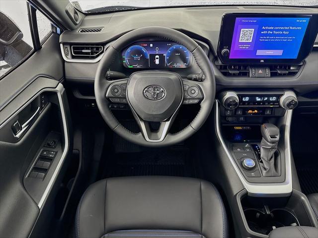 Photo of 2025 Cavalry Blue/Midnight Black Metallic Toyota RAV4 Hybrid